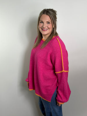 Pink Sweater with Orange Trim