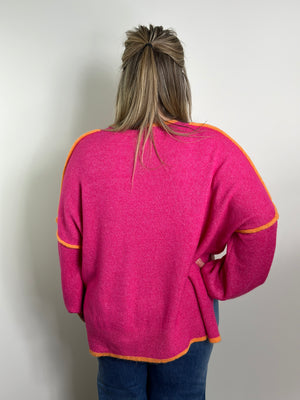 Pink Sweater with Orange Trim