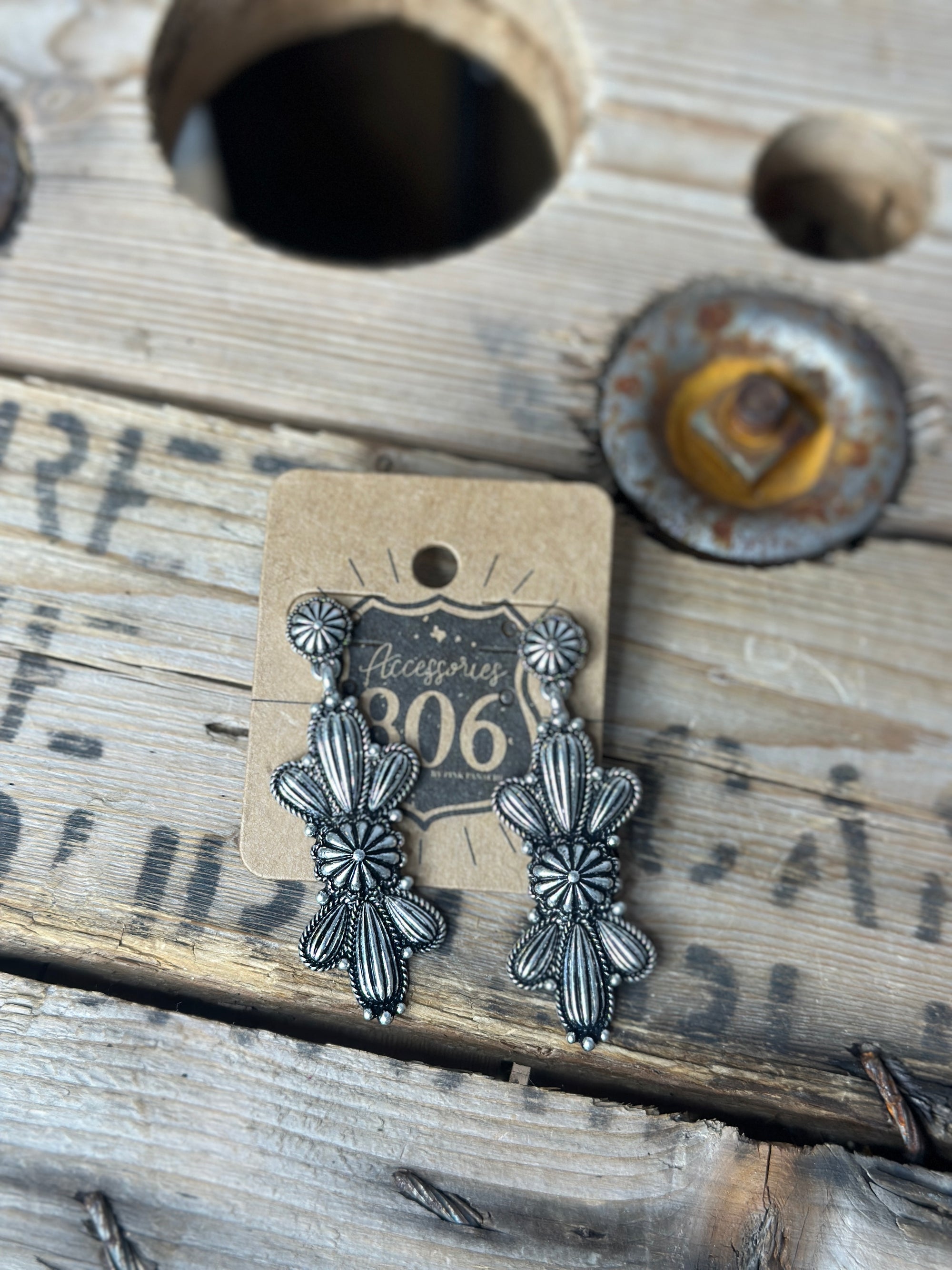 Western silver butterfly concho earring
