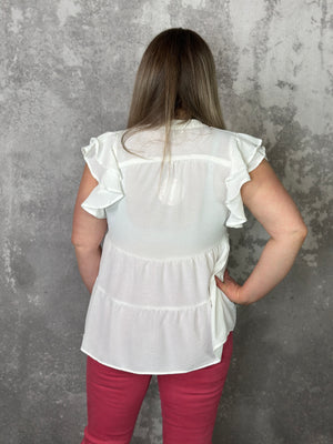 The White Baby Doll Ruffle Top
