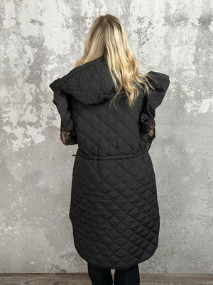 Long Quilted Vest with Ruffle Detail