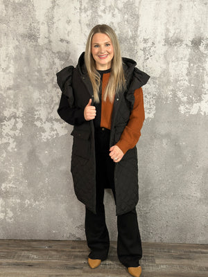 Long Quilted Vest with Ruffle Detail