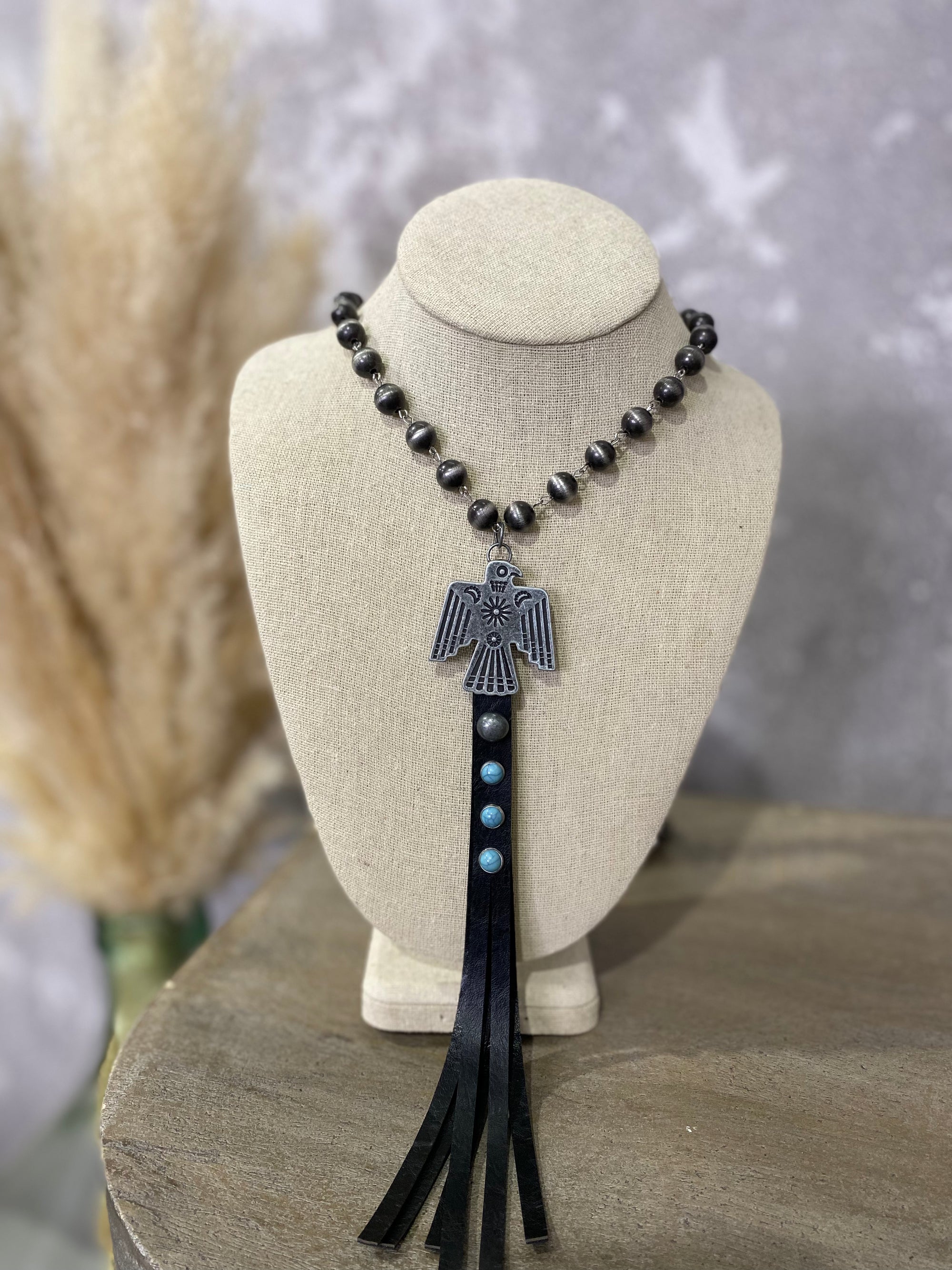 Thunderbird Leather Tassel and Turquoise Necklace